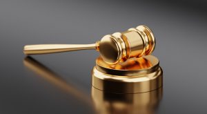Van Nuys Property Crime Defense Canva Golden Hammer and Gavel 300x165