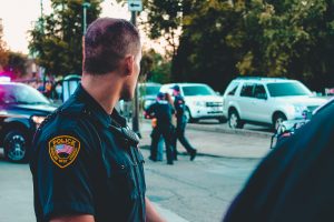 Hermosa Beach Theft Defense Canva Man Wearing Black Officer Uniform 300x200
